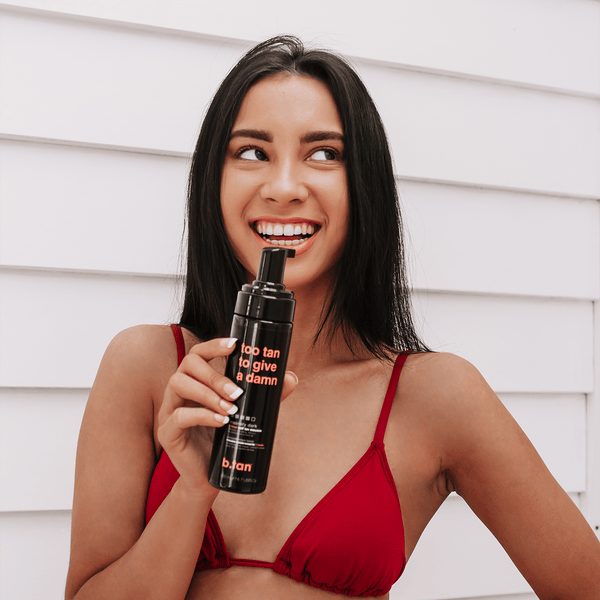 too tan to give a damn b.tan